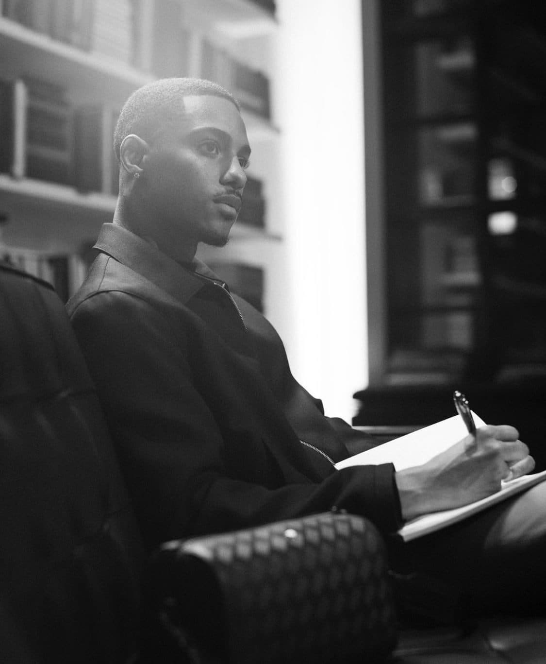 Screenwriter working in a library armchair