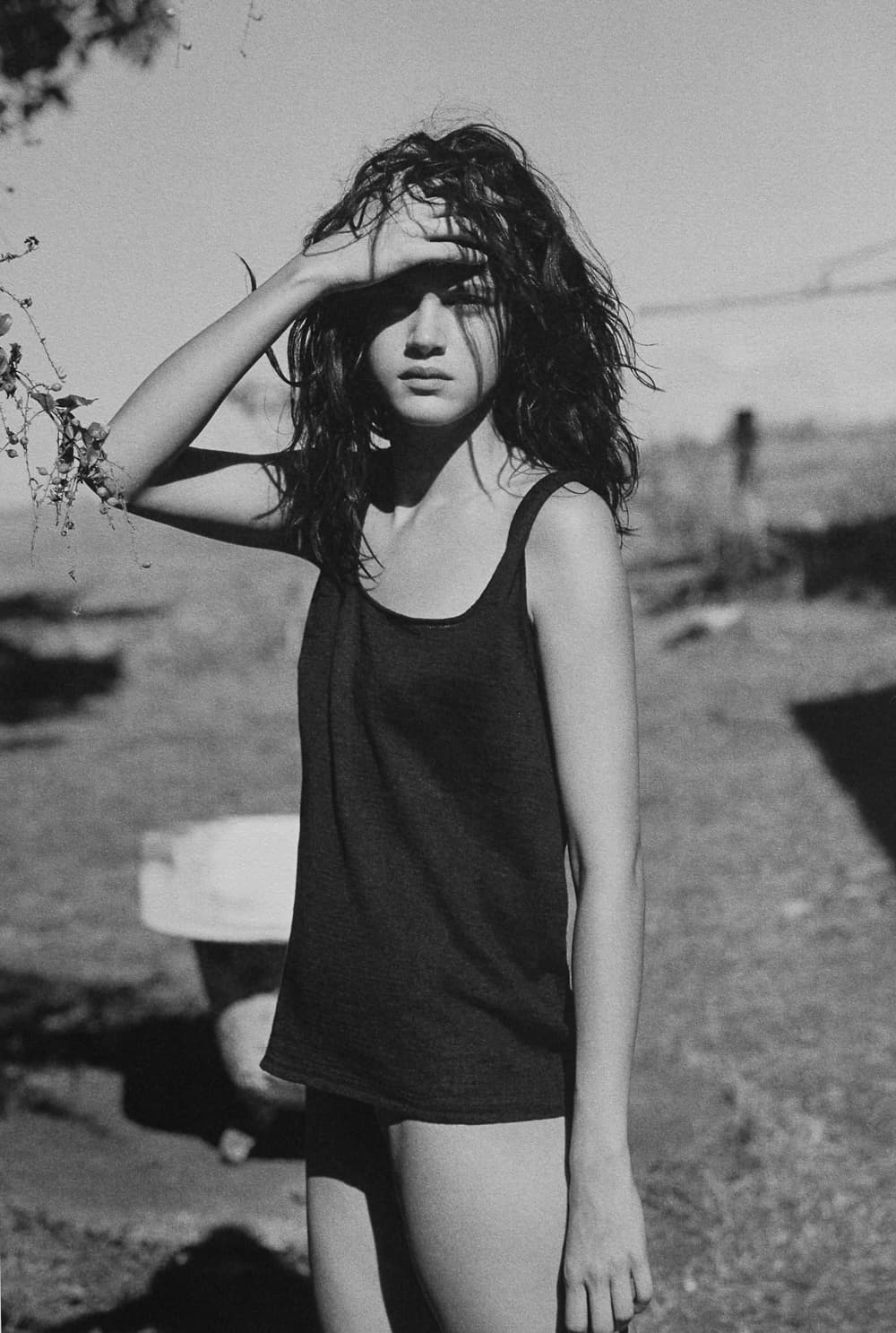 Black and white fashion reference, controlled editorial pose from Fashion Editorials